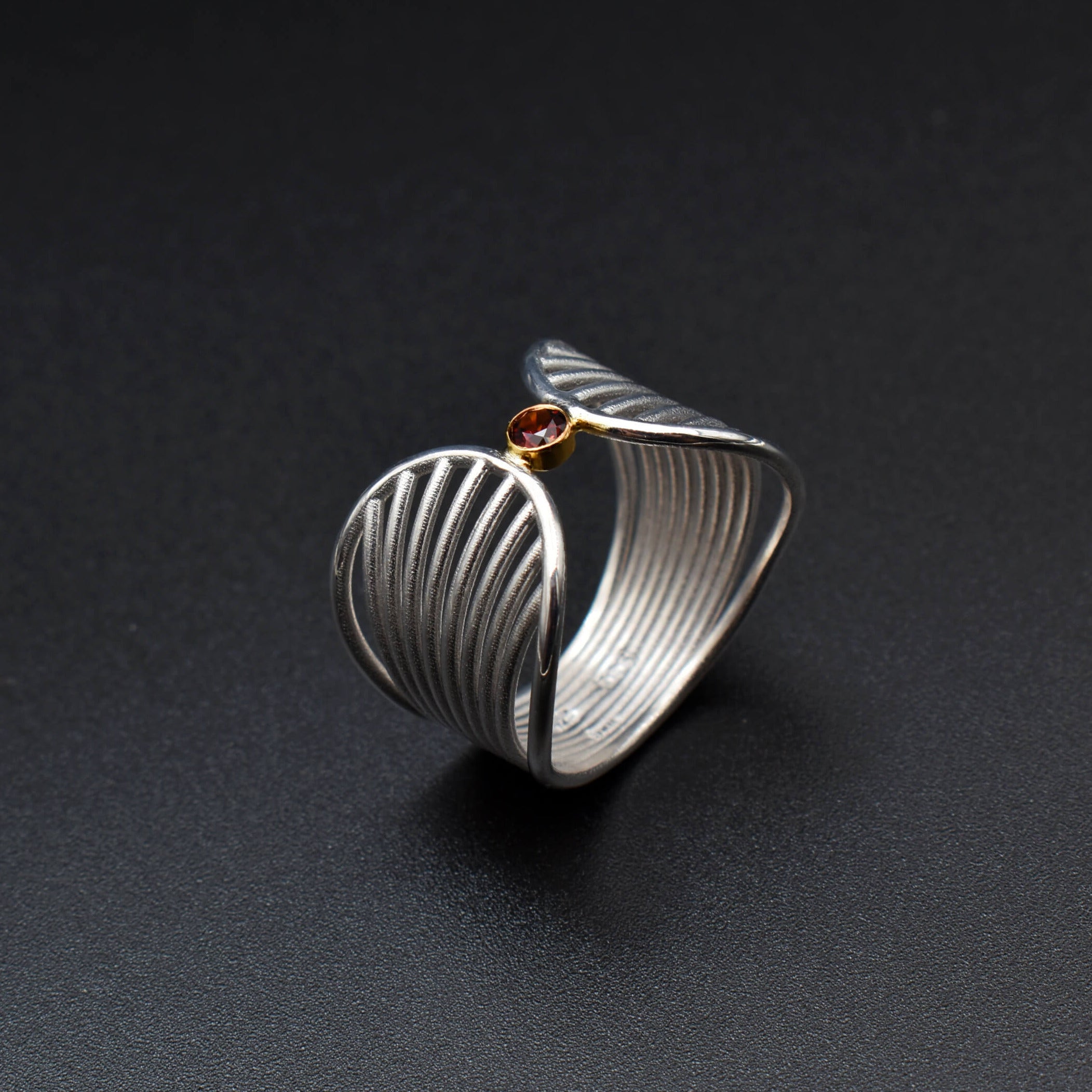 Whispering Curves: A Silver&Gold Ring Inspired by Femininity