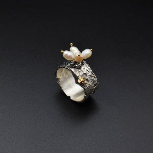 Boho-chic gold & silver ring adorned with natural pearls