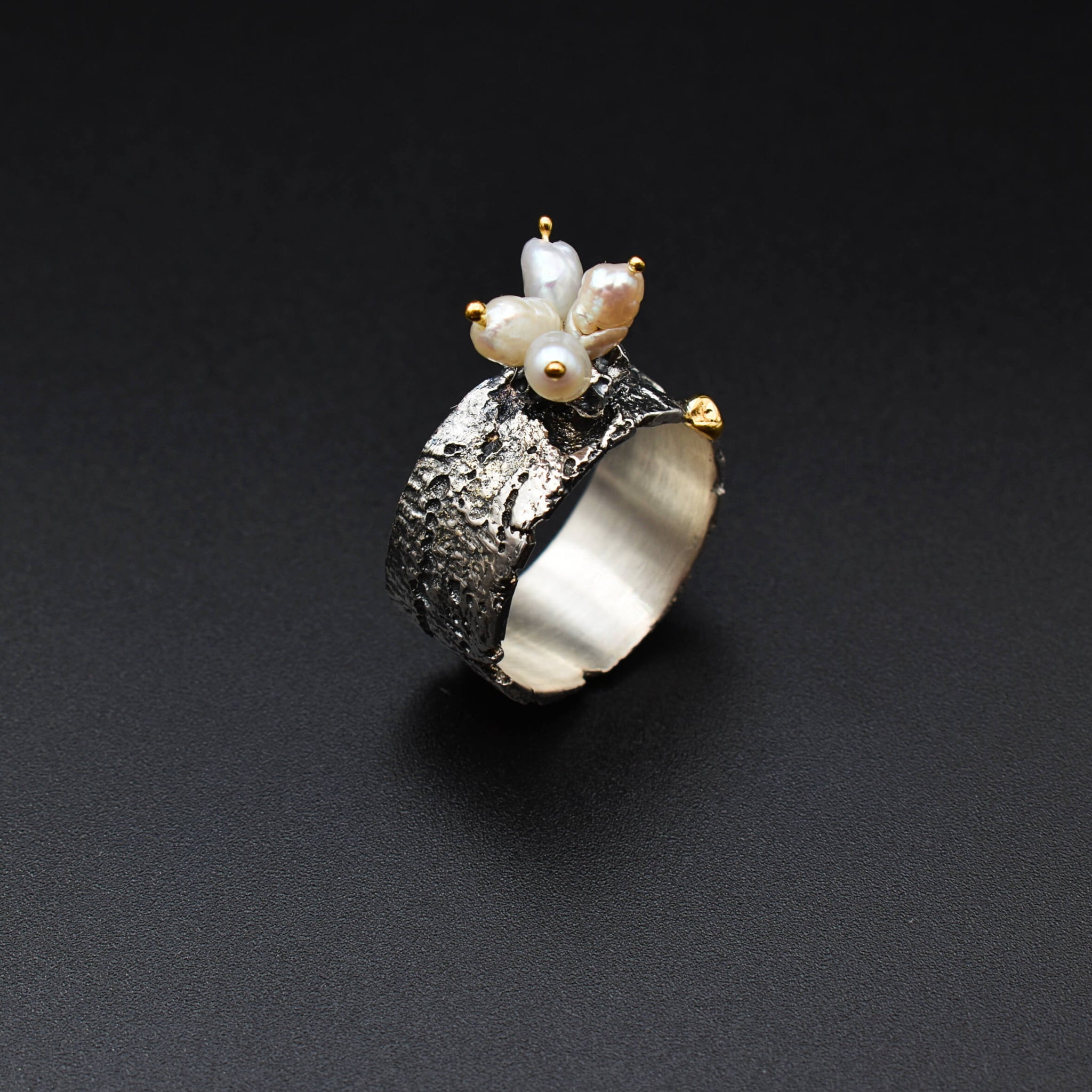 Boho-chic gold & silver ring adorned with natural pearls