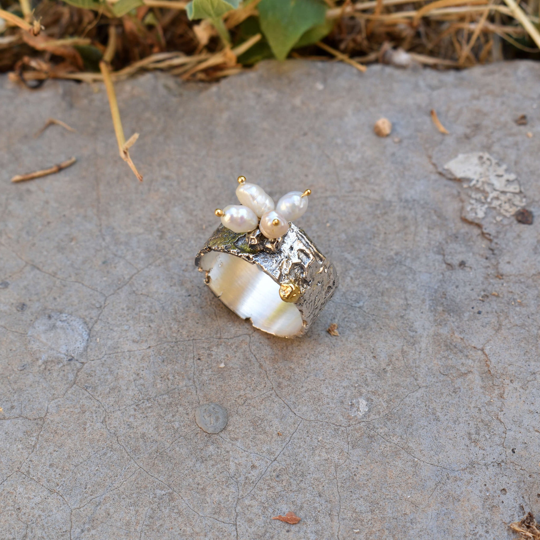 Boho-chic gold & silver ring adorned with natural pearls