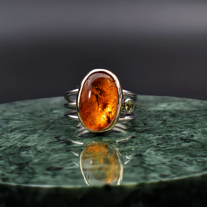 Unique Amber Ring with Trapped Mosquitos - 14k Gold &  Silver Peridot stone