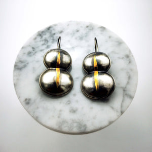 Stylish and elegant silver earrings that inspired by an ancient mural in Knossos Palace in Crete. The earrings are oxidized and a part of it gold plated.