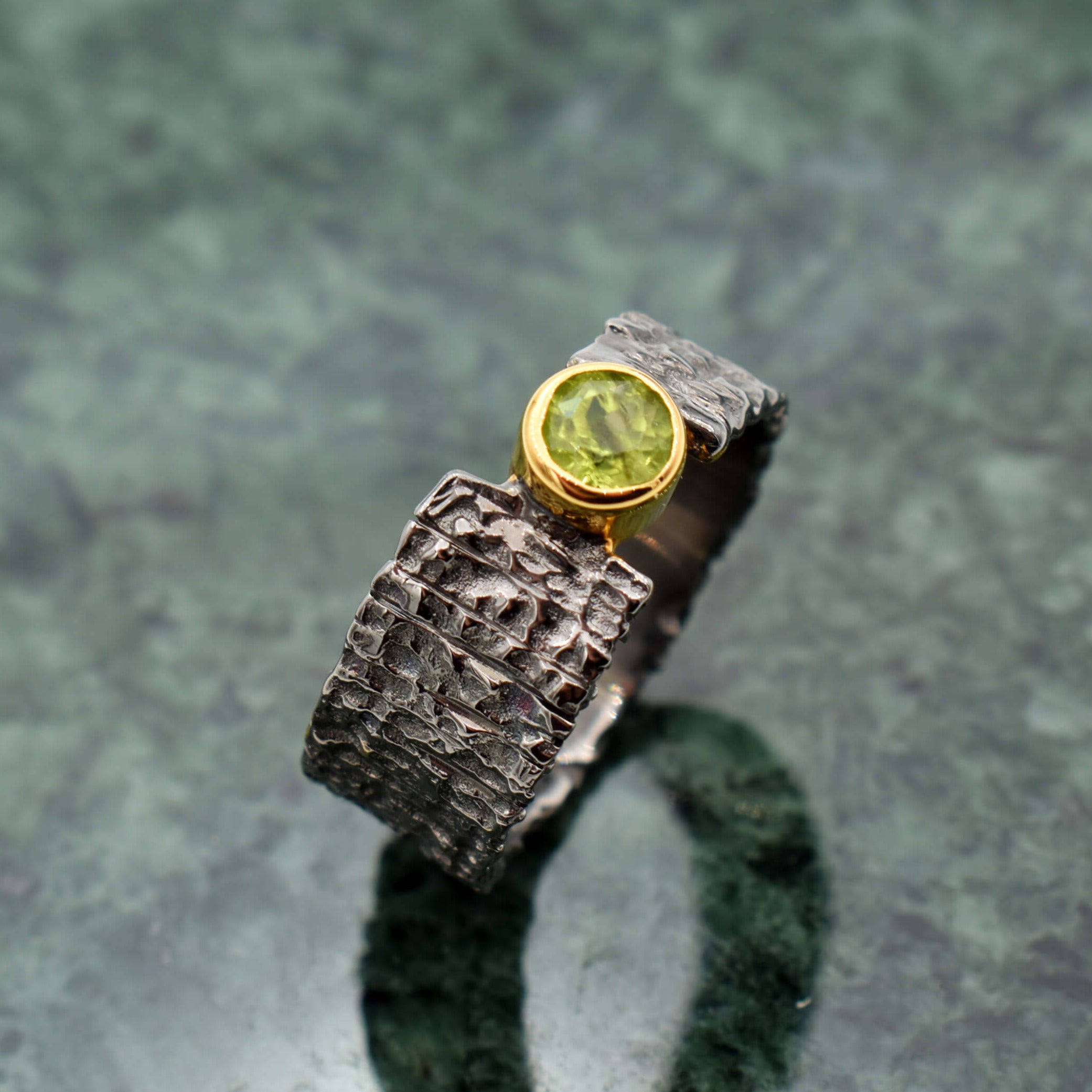 Handmade silver ring with natural peridot